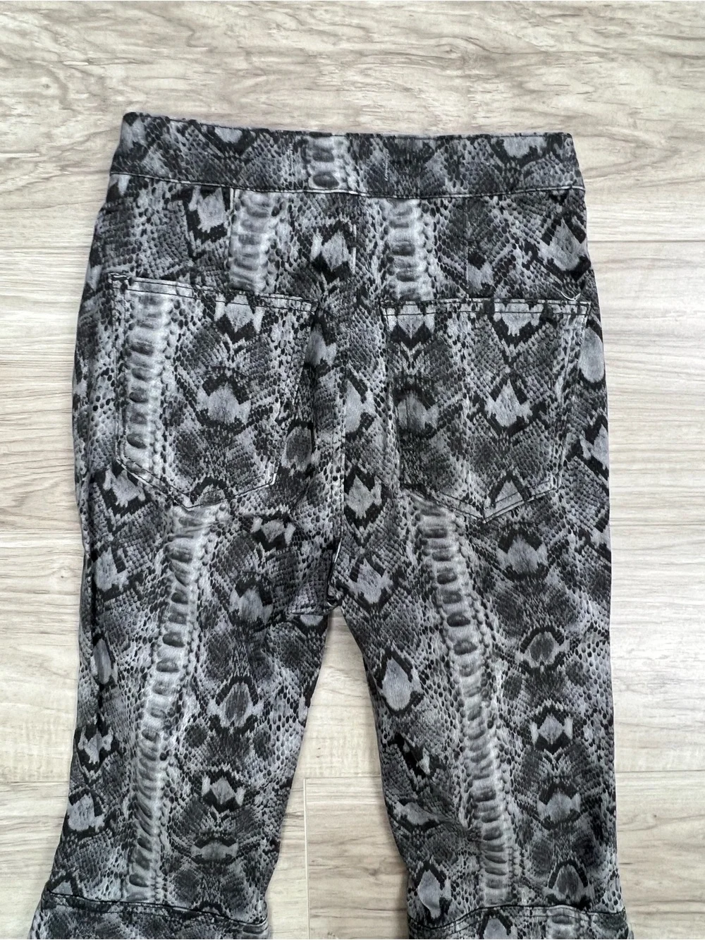 We The Free Free People Just Float On Snake Print Flare Bell Bottom Jeans